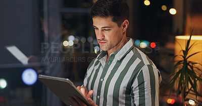 Buy stock photo Night, business and man with tablet, typing and internet with research for proposal, thinking and stock market. Person, evening or employee with tech, professional and website for trading or planning