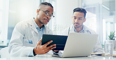 Buy stock photo Doctors, meeting and men in hospital with tablet for discussion, treatment plan or diagnosis. Talking, healthcare and medical professionals  with laptop for conversation, teamwork or collaboration