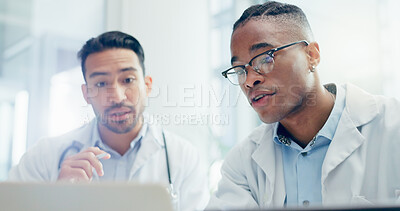 Buy stock photo Meeting, doctors and men in clinic with laptop for discussion, treatment plan or diagnosis. Talking, healthcare and medical professionals with technology for conversation, teamwork or collaboration