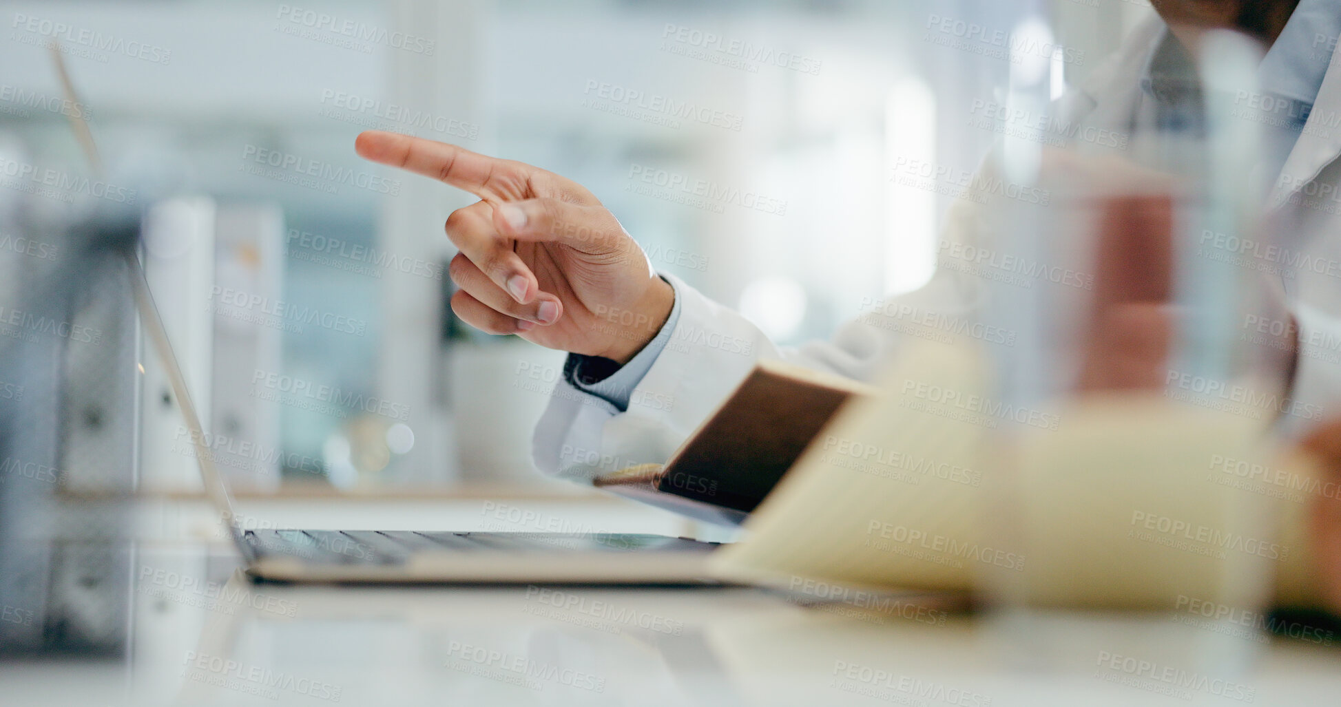 Buy stock photo Doctor, hands and pointing with laptop for video call, healthcare or consulting at hospital. Medical employee with finger or book by computer in consultation for research or Telehealth at clinic desk