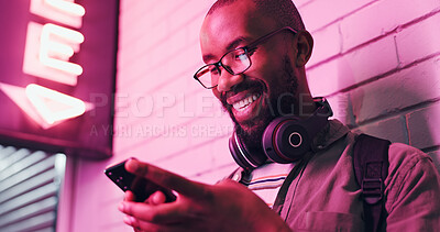 Buy stock photo Cellphone, typing and black man with smile, headphones and communication with contact and online. Student, social media and chat on app, texting and happy in campus, college and Gen z with connection