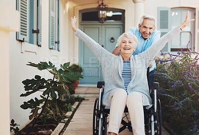 Buy stock photo Senior couple, wheelchair and smile for celebration, fun and woman with disability outside. Freedom, husband and break from retirement home with male person, outing and nature together in garden  