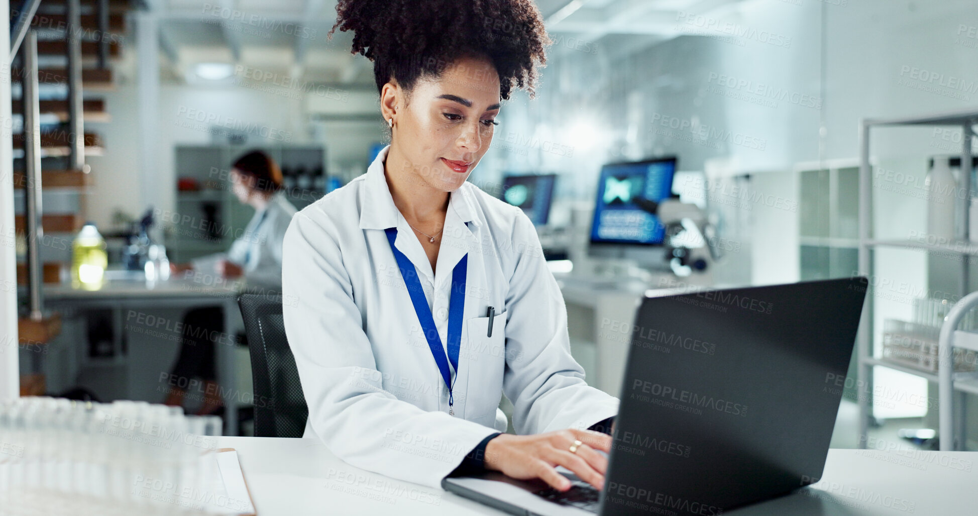 Buy stock photo Scientist, woman and typing on laptop in laboratory, medical professional and bioinformatics analysis online for research. Innovation, information study and recording experiment, data and results