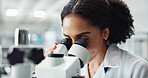 African woman, scientist and microscope with research for cancer treatment at pharmaceutical lab. Person, study and innovation for drugs, medication or zoom on cell for results with chemical formula