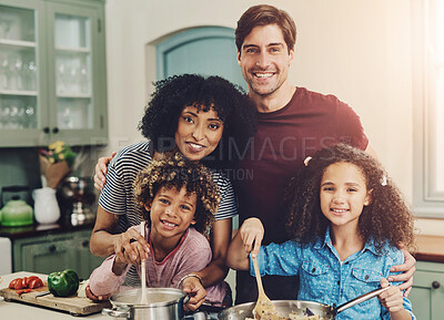 Buy stock photo Happy, family and portrait for cooking in kitchen with vegetables, teaching and nutrition salad of lunch meal. Smile, interracial parents and kids for learning vegan diet, healthy dinner and house