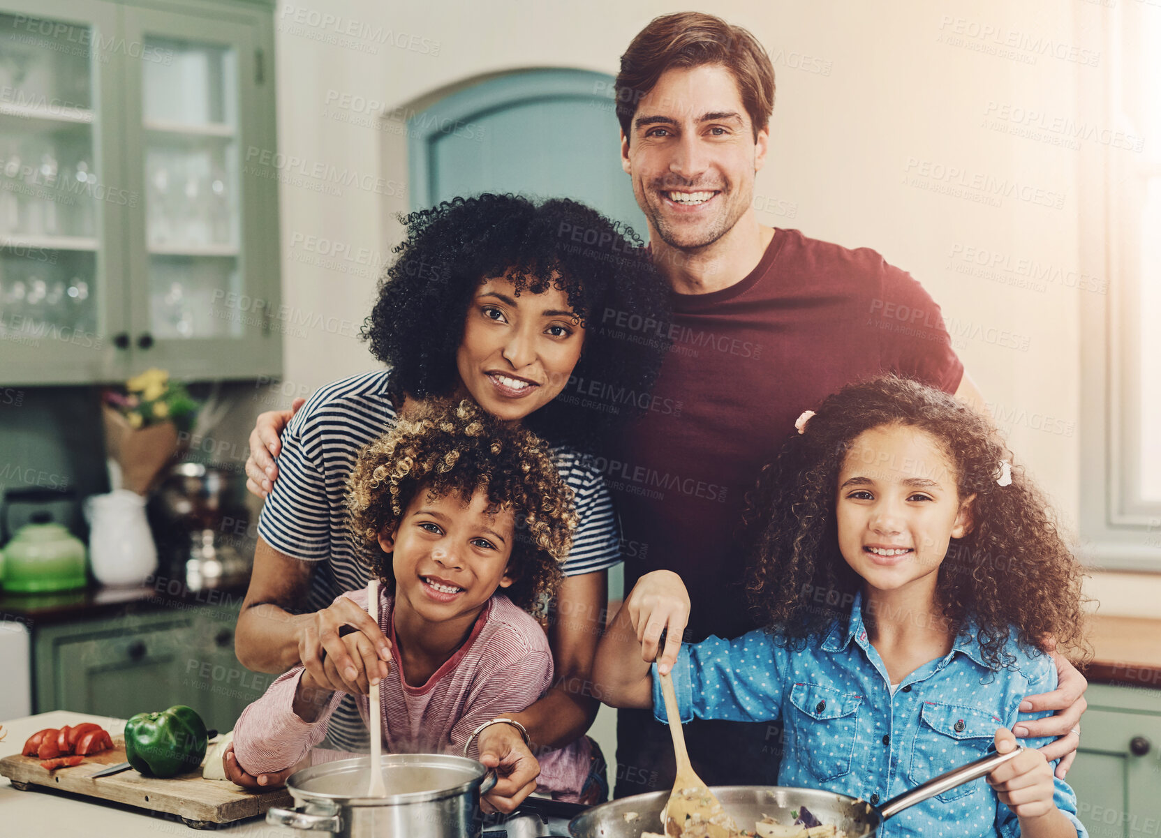 Buy stock photo Happy, family and portrait for cooking in kitchen with vegetables, teaching and nutrition salad of lunch meal. Smile, interracial parents and kids for learning vegan diet, healthy dinner and house