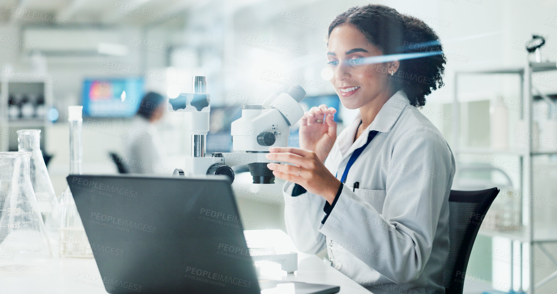 Buy stock photo Laptop, microscope and scientist with research in laboratory for medical innovation with biotechnology. Science, computer and female biologist typing online for pharmaceutical experiment in office.