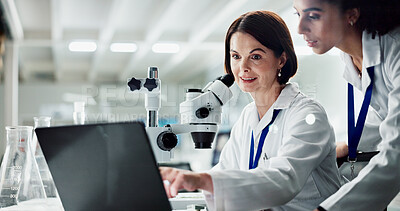 Buy stock photo Happy woman, scientist and coaching intern with laptop for research, discovery or breakthrough at lab. Female person training junior biologist on computer in medical study, exam or test at laboratory