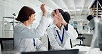 Women, high five and laptop in lab for science, notification or celebration for research project. People, scientist and lab partner by computer for cheers, excited or results for funding application