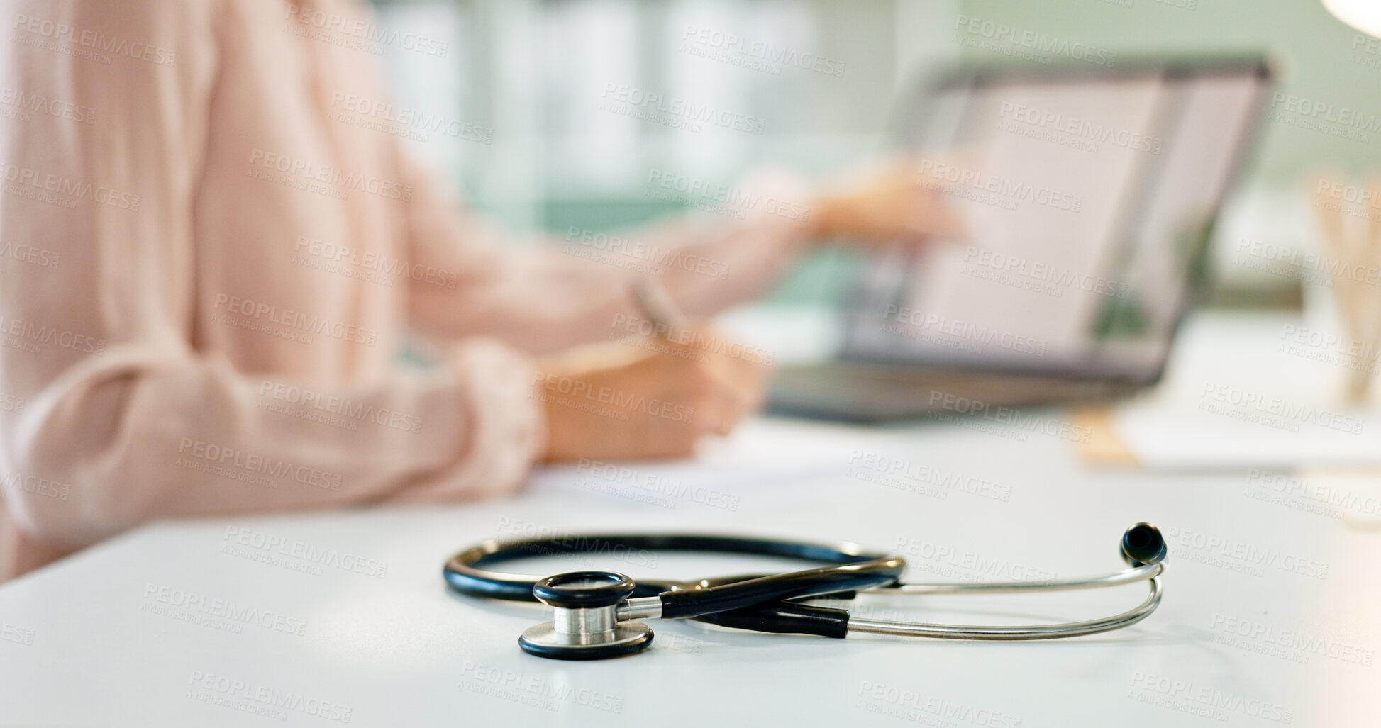 Buy stock photo Healthcare, table and closeup of stethoscope in hospital for cardiology, lungs examination and breathing test. Medicine, medical tool and listening equipment on office desk in clinic for heart health