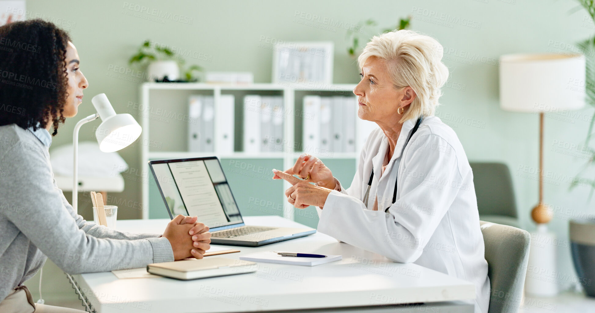 Buy stock photo Mature woman, doctor and consulting with patient for medication, prescription or diagnosis at hospital. Female person talking to client for dosage, steps or list in consultation at office or clinic