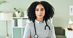 Crossed arms, doctor and portrait of black woman with stethoscope for medical care, support and health. Hospital, healthcare and professional person for cardiology, pulmonary service and wellness