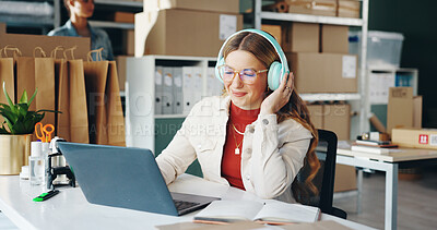 Buy stock photo Woman, laptop and small business with headphones, reading and logistics for courier, sales report and ecommerce. Entrepreneur, computer and planning schedule for cargo delivery or web supply chain