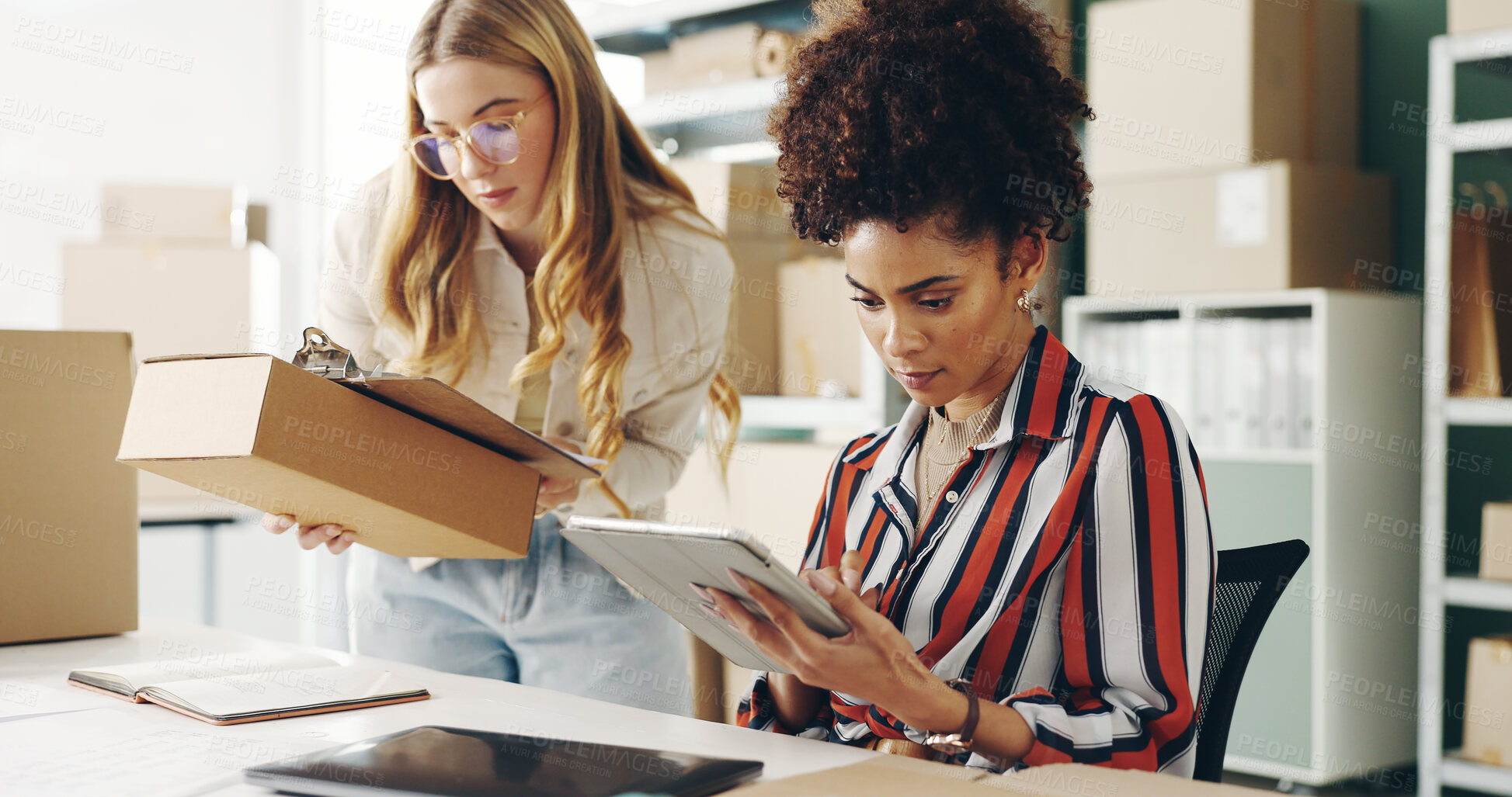 Buy stock photo Women, tablet and teamwork with boxes, package and e commerce checklist for online shop, stock or supply chain. Young people with small business and digital tech or clipboard for logistics and order