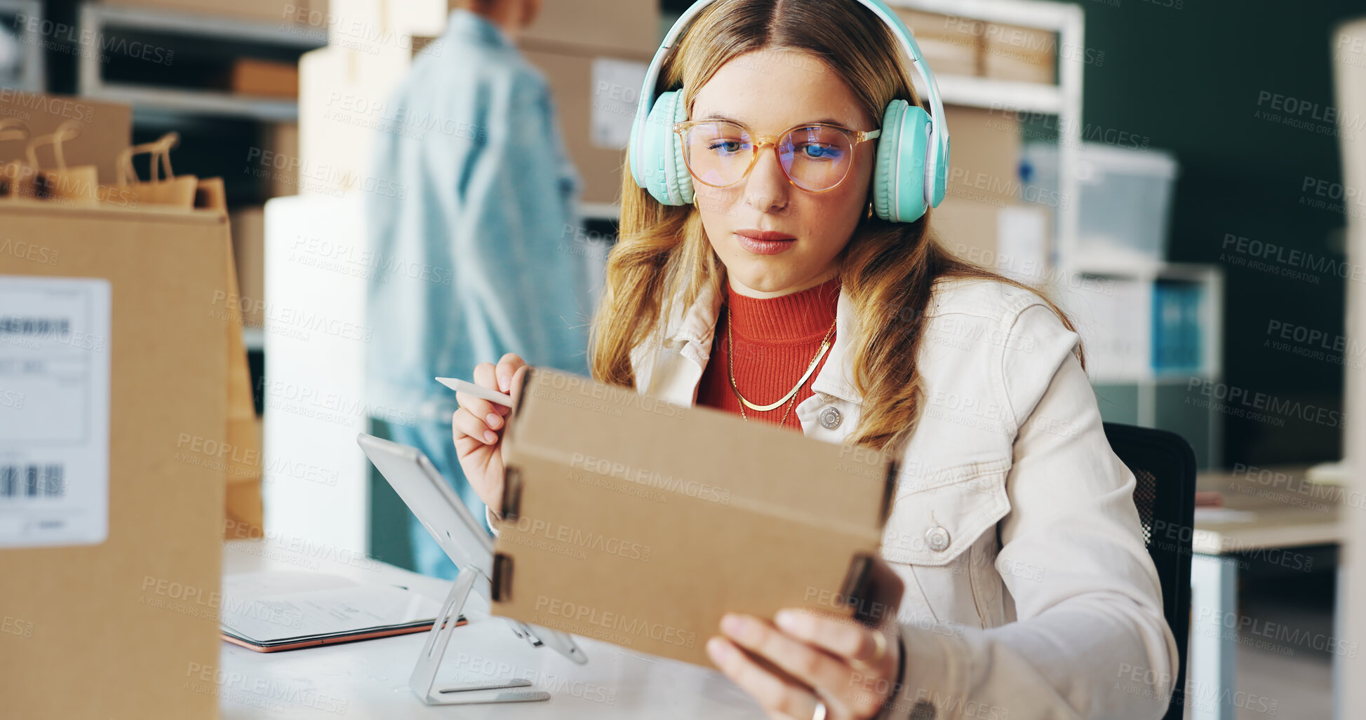 Buy stock photo Industry, headphones and woman with package, box and parcel with ecommerce, delivery and entrepreneur. Business, sound and worker with cardboard, logistics order and listening to music with headset