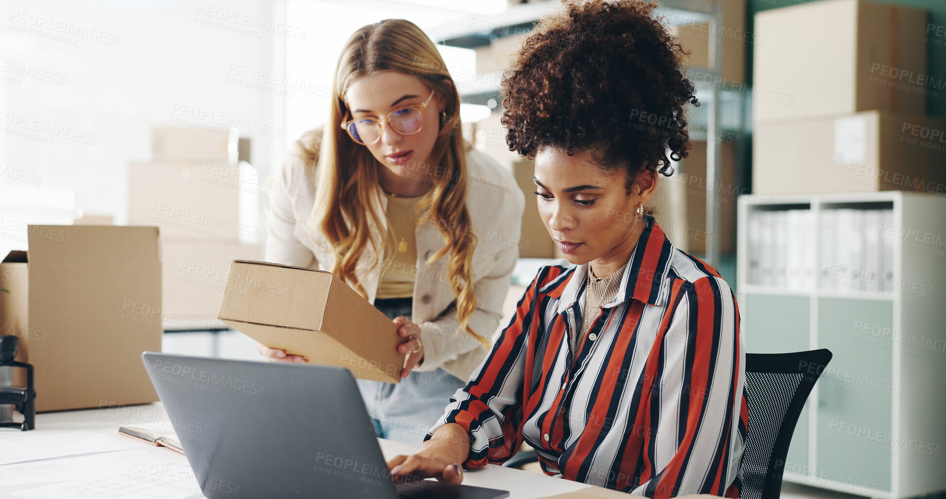 Buy stock photo Women, laptop and box at startup, together and check inventory for order, stock or product code in workshop. People, partner and computer with reading, admin and logistics for e commerce distribution