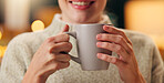 Woman, smile and hand with coffee in mug for restaurant, beverage and satisfaction in morning. Happy, female person and relax with warm drink in cup for weekend, enjoyment and cappuccino in cafe