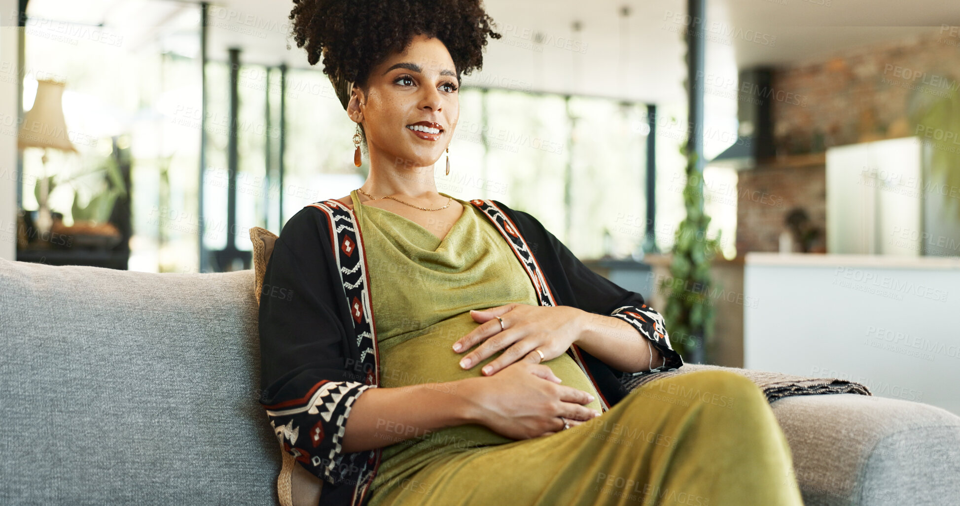 Buy stock photo Pregnant, love and happy woman on sofa with hands on stomach for comfort, touch and resting at home. Pregnancy, care and calm girl person relax in living room with peace, belly and healthy maternity