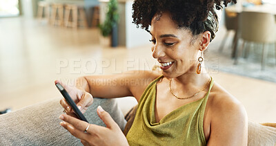 Buy stock photo Woman, phone and relax on sofa to chat, typing and search on social media or internet in home. Female person, texting and smile for online communication, connection and app for message in lounge