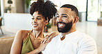 Watching tv, happy and couple on sofa relax for bonding, loving relationship and weekend. Marriage, home and man and woman streaming movies on couch for affection, romance and smile in living room