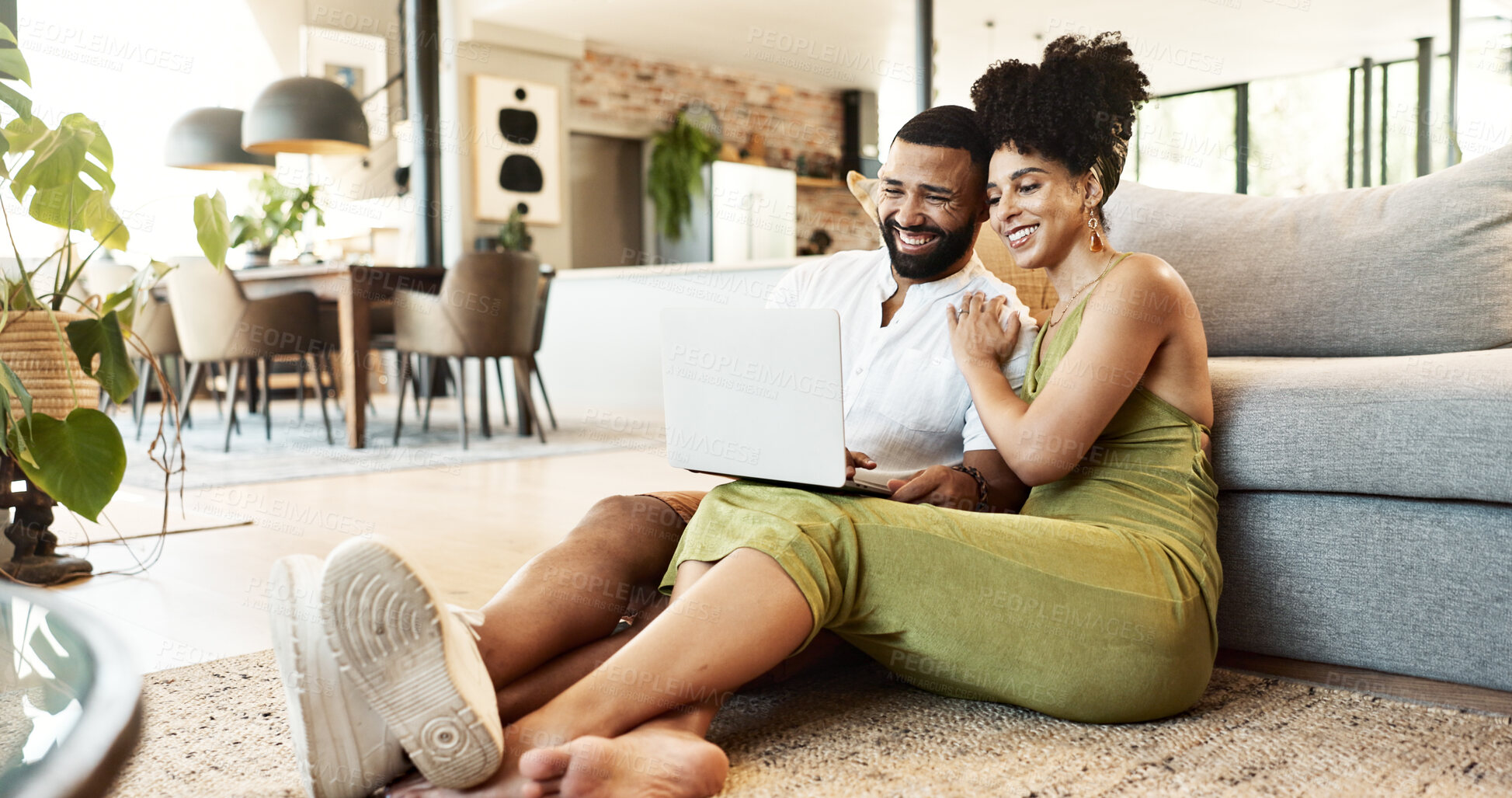 Buy stock photo Laptop, relax and couple on floor in home for watching movies, entertainment and streaming in living room. Marriage, love and happy man and woman on computer for internet, website and online videos