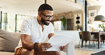 Buy stock photo Man, paperwork and happy with finance in home for mortgage loan, investment planning and bills. Person, glasses and smile with budget documents on sofa with invoice for expenses, savings and taxes