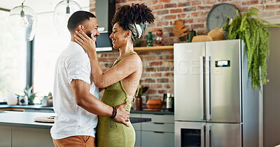 Buy stock photo Kitchen, happy and couple hug in new home for bonding, loving relationship and commitment together. Homeowner, marriage and man and woman embrace for affection, romance and love in house or apartment