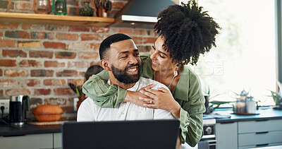 Buy stock photo Happy, hug and couple with laptop in home with investment, savings and budget for bills. Smile, banking and financial payment with woman and celebration together from profit and technology in kitchen