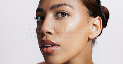 Buy stock photo Studio, shine and face of woman, makeup and results of treatment, soft and confidence for glow or beauty. Pink background, portrait and pride of skin, dermatology and cosmetics for person or skincare