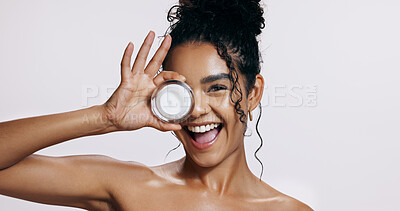 Buy stock photo Woman, skincare and natural beauty portrait with cream, cosmetics and sunscreen product with smile. White background, facial and skin glow with wellness and anti aging face lotion in a studio