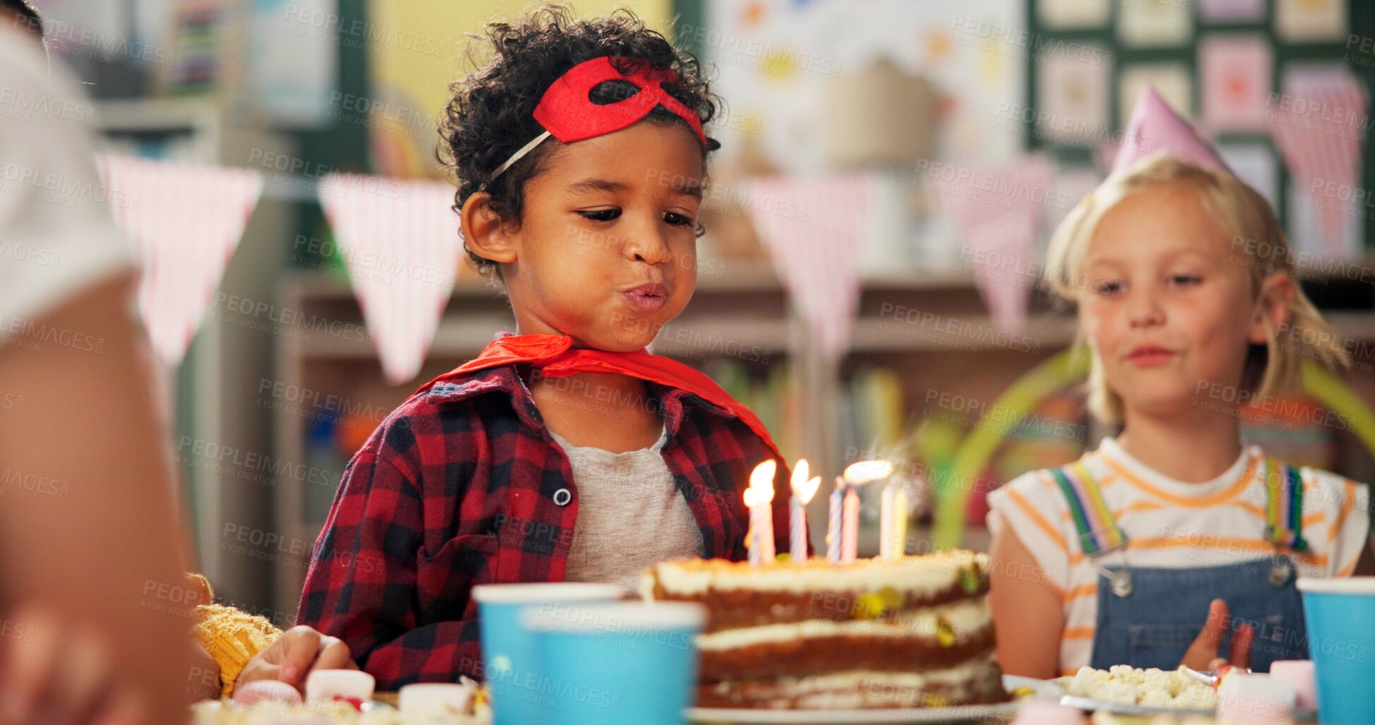 Buy stock photo Birthday cake, classroom and children with blowing of candles for special event, development and growth. Happy, friends and smile with party at school table for celebration, love and support