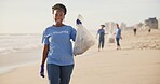 Face, beach or happy black woman with plastic bag for earth day, sustainability or ocean cleaning project. Recycle, sustainability and portrait of volunteer at sea for NGO, accountability or charity