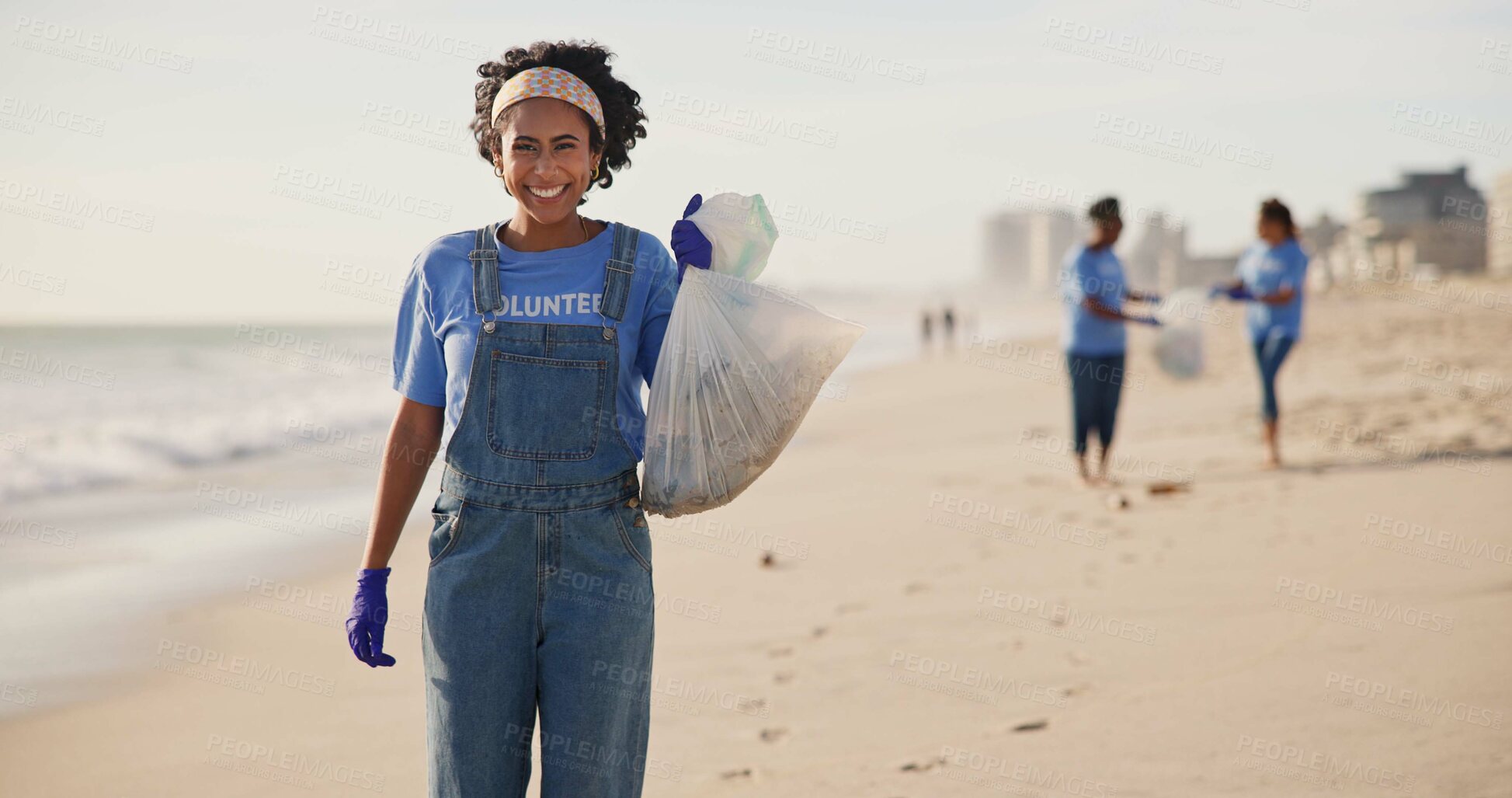 Buy stock photo Beach, volunteer or happy woman with plastic bag for sustainability, help or ocean cleaning project. Accountability, portrait and volunteer at sea for earth day, social responsibility or NGO charity