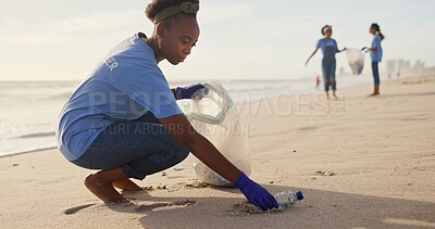 Buy stock photo Volunteer, beach or woman with plastic, bottle or bag in nature for sustainability, help or ocean cleaning project. Accountability, team or friends at sea for earth day, social responsibility or NGO