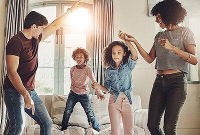 Buy stock photo Dancing, parents and children with love, support and care for trust, together or happiness in bonding. Family, woman and kids with man in play, connection and comfort on couch in home or living room