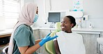 Happy woman, dentist and patient with consultation for dental care, teeth cleaning or treatment at clinic. Young female person or orthodontist consulting customer for oral, gum or tooth whitening