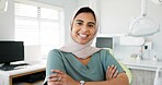 Muslim dentist, woman and happy with face, arms crossed and pride for career, healthcare and wellness. Person, dentistry doctor and happy with hijab for faith with confidence in medical workplace