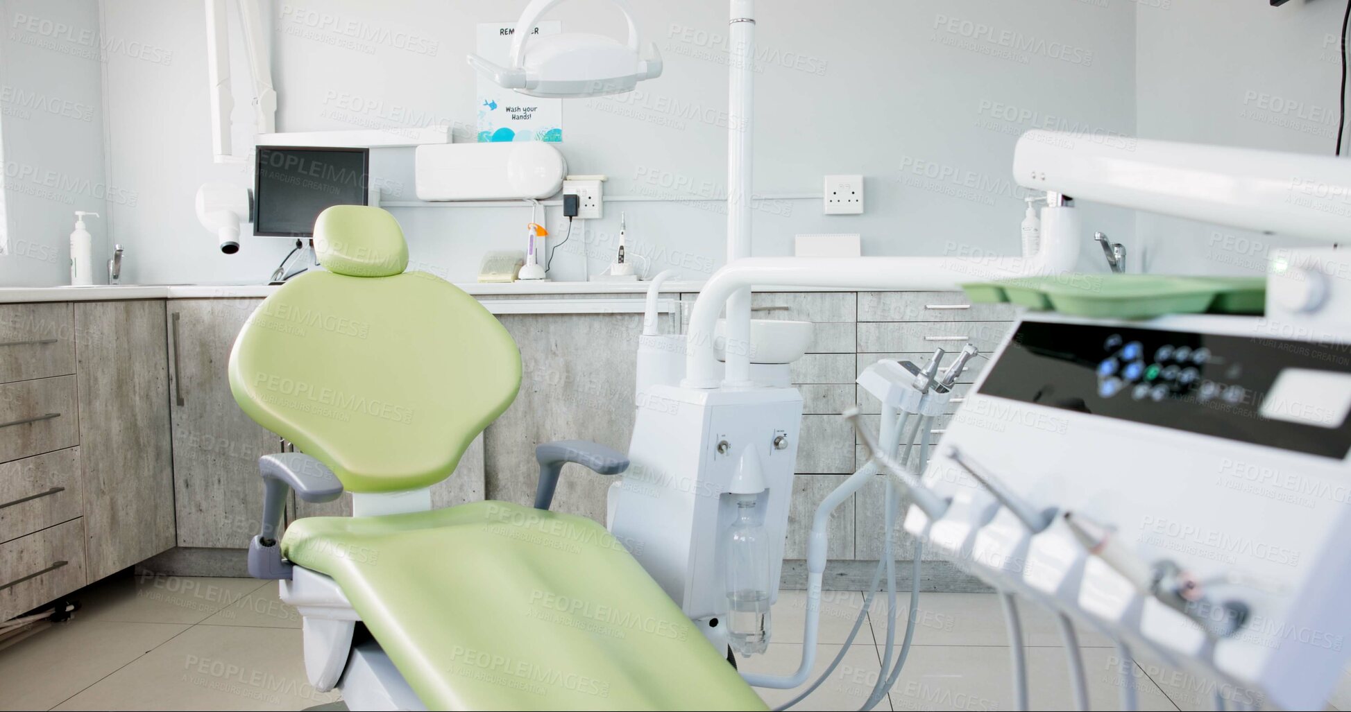 Buy stock photo Empty dentist room, chair and equipment for cleaning, wellness and oral health with tools in clinic. Hospital, dental and mouth care by furniture, machine or interior for teeth, surgery or consulting