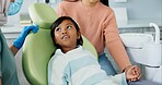 Kid, orthodontist and appointment for teeth or oral health education for prevention on tooth decay or hygiene. Little girl, mom and together for dentistry checkup or dental examination with dentist.