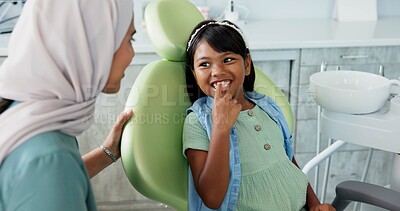 Buy stock photo Little girl, dentist and appointment for teeth or oral health education for prevention on tooth decay or hygiene. Kid, orthodontist and together for advice on dentistry checkup or dental examination.