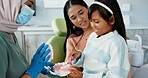 Child, pediatric dentist or teach on brushing teeth in practice or kid friendly demonstration of tooth hygiene. Orthodontist, parent or girl by dental model or cleaning mouth in interactive education