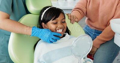 Buy stock photo Child, dentist or examination of teeth in surgery, trust or patient by doctor for oral hygiene. Girl, parent or support in consultation by tooth professional or mirror for interactive dental checkup