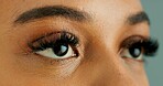 Eyes, thinking and vision with person closeup in studio for hope, optimism or contemplation. Eye health, future and planning with model looking away for natural cosmetics, optometry or satisfaction