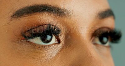 Buy stock photo Eyes, thinking and vision with person closeup in studio for hope, optimism or contemplation. Eye health, future and planning with model looking away for natural cosmetics, optometry or satisfaction