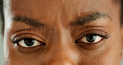 Buy stock photo Confused, woman and closeup of eyes with frown for strain, optical care and health. Stress, question and zoom portrait of young African female person with vision, eyesight and ophthalmology.