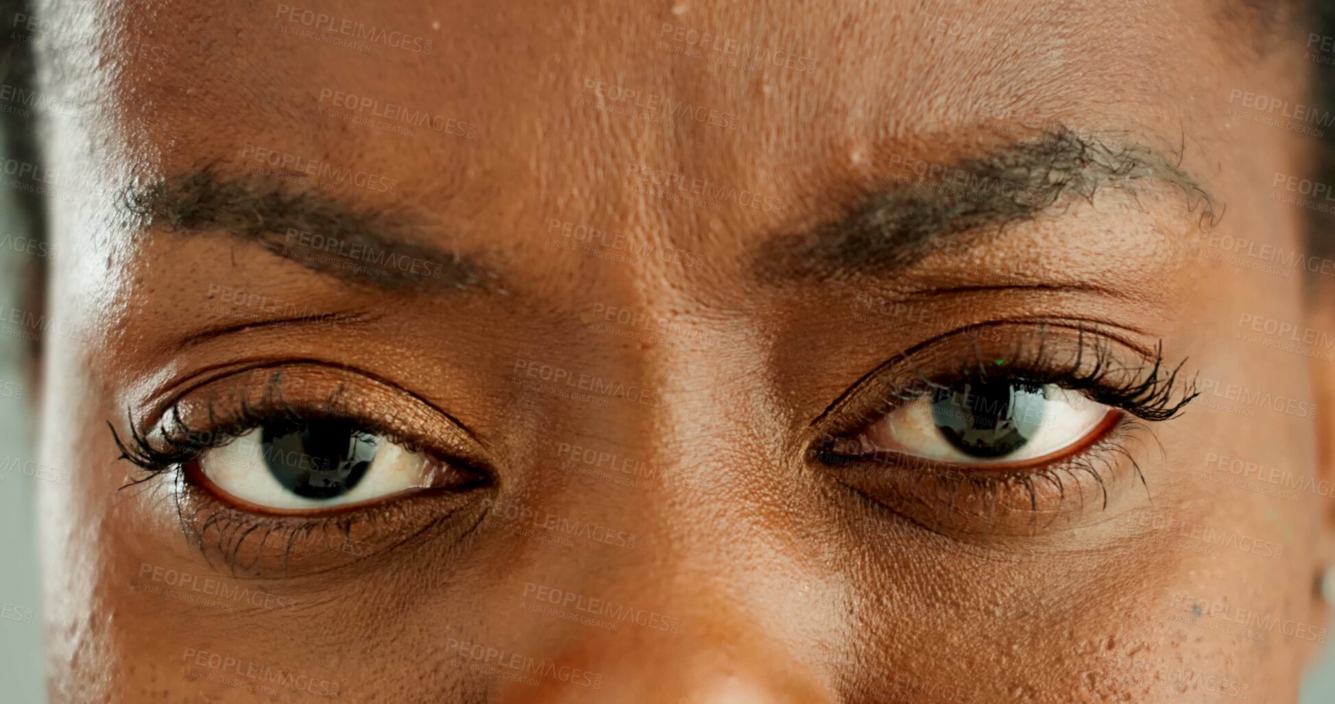 Buy stock photo Confused, woman and closeup of eyes with frown for strain, optical care and health. Stress, question and zoom portrait of young African female person with vision, eyesight and ophthalmology.