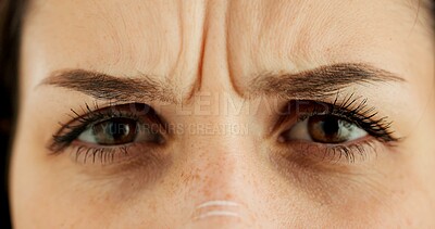 Buy stock photo Confused, woman and closeup of eyes with frown for strain, optical care and health. Stress, question and zoom portrait of young female person with Canada for vision, eyesight and ophthalmology.