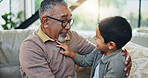 Grandfather, child and relax on sofa at house for bonding, love and memory for care on weekend break. Smile, mature man and boy with excited gratitude, support and trust together in childhood home