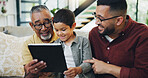 Tablet, sofa and kid with father and grandfather choose movie, video or film together. Happy, bonding and boy child watching film on digital technology with dad and senior man in living room at home.