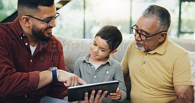 Buy stock photo Tablet, sofa and boy with father and grandfather choose movie, video or family together. Happy, bonding and child watching film on digital technology with dad and senior man in living room at home.